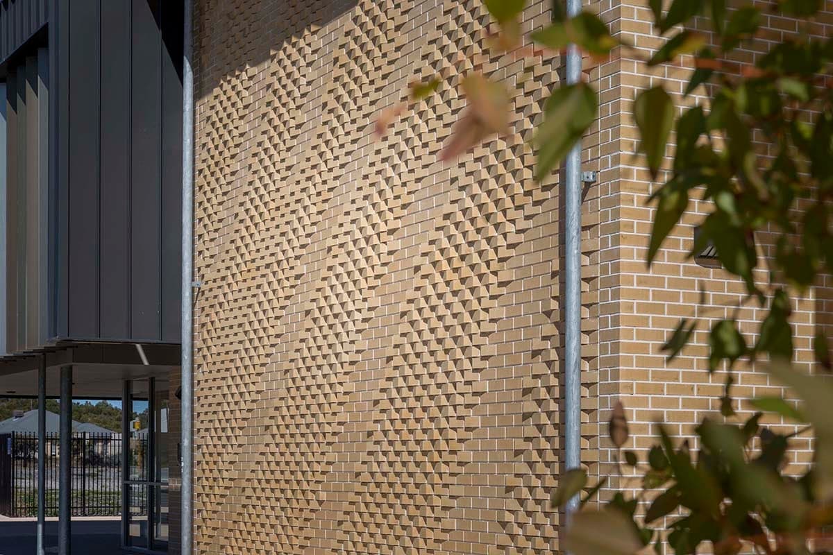 Rhythm and Flow — Integrated brick, glazing and aluminium louvres, Yanchep Secondary College