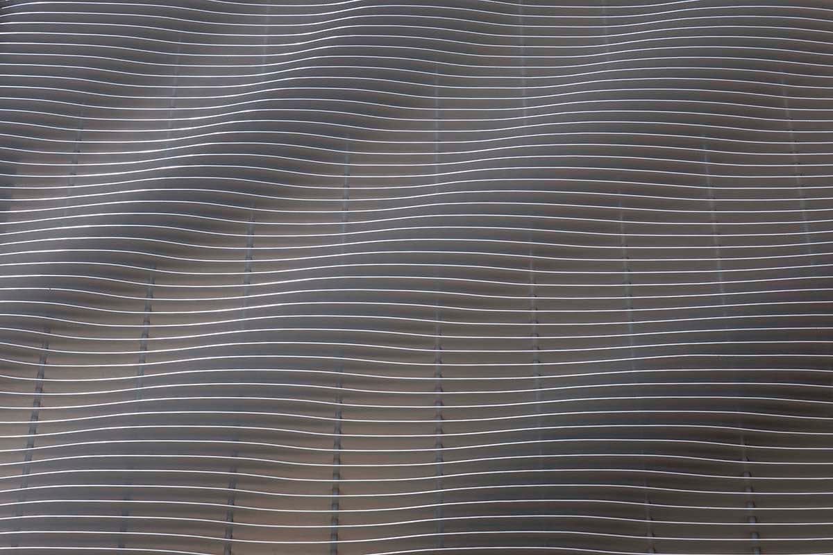 Rhythm and Flow — Integrated brick, glazing and aluminium louvres, Yanchep Secondary College