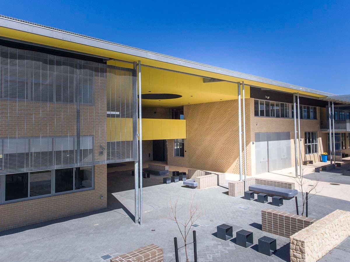 Rhythm and Flow — Integrated brick, glazing and aluminium louvres, Yanchep Secondary College