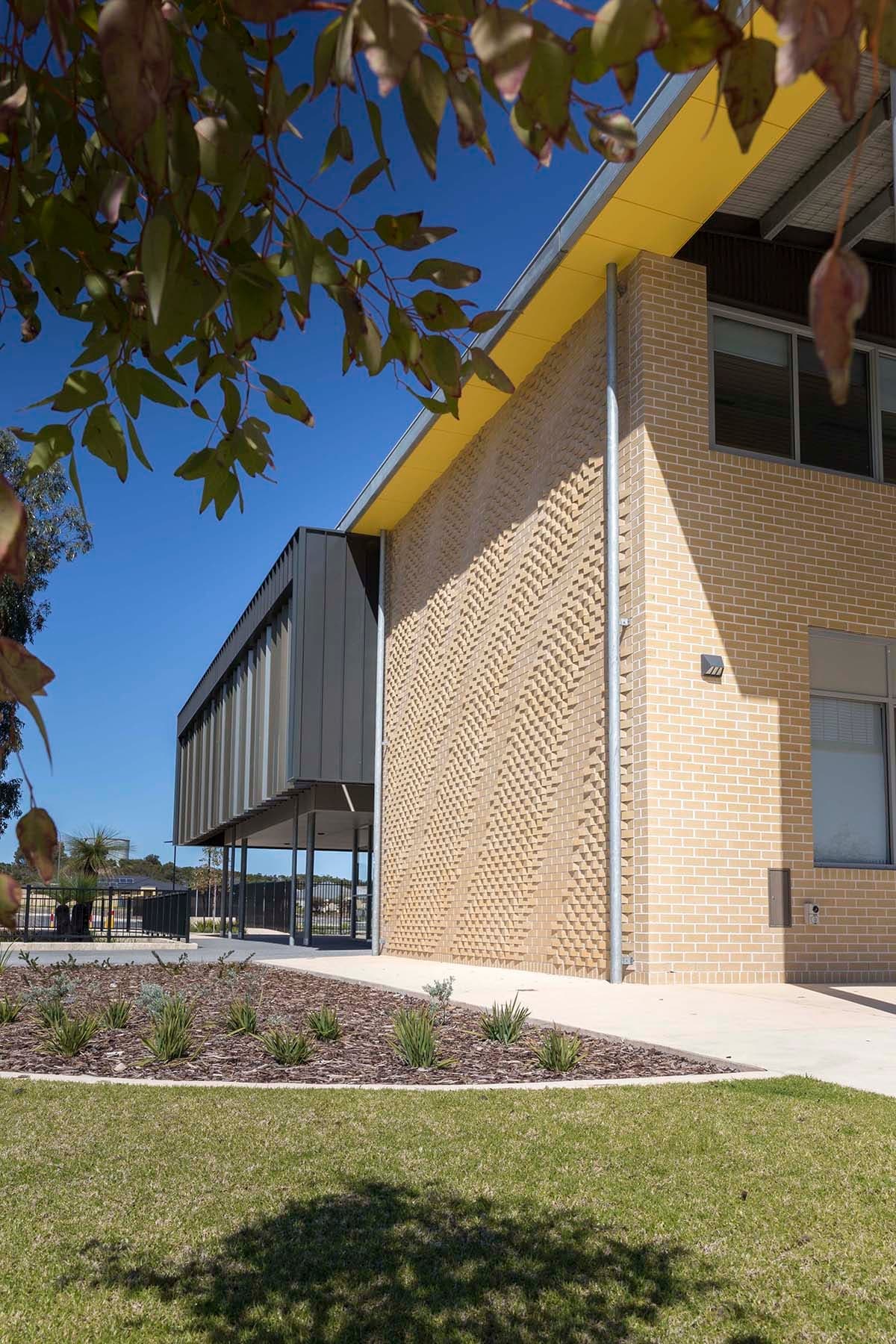 Rhythm and Flow — Integrated brick, glazing and aluminium louvres, Yanchep Secondary College