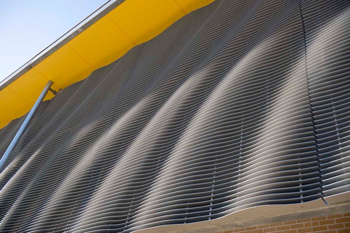 Rhythm and Flow — Integrated brick, glazing and aluminium louvres, Yanchep Secondary College