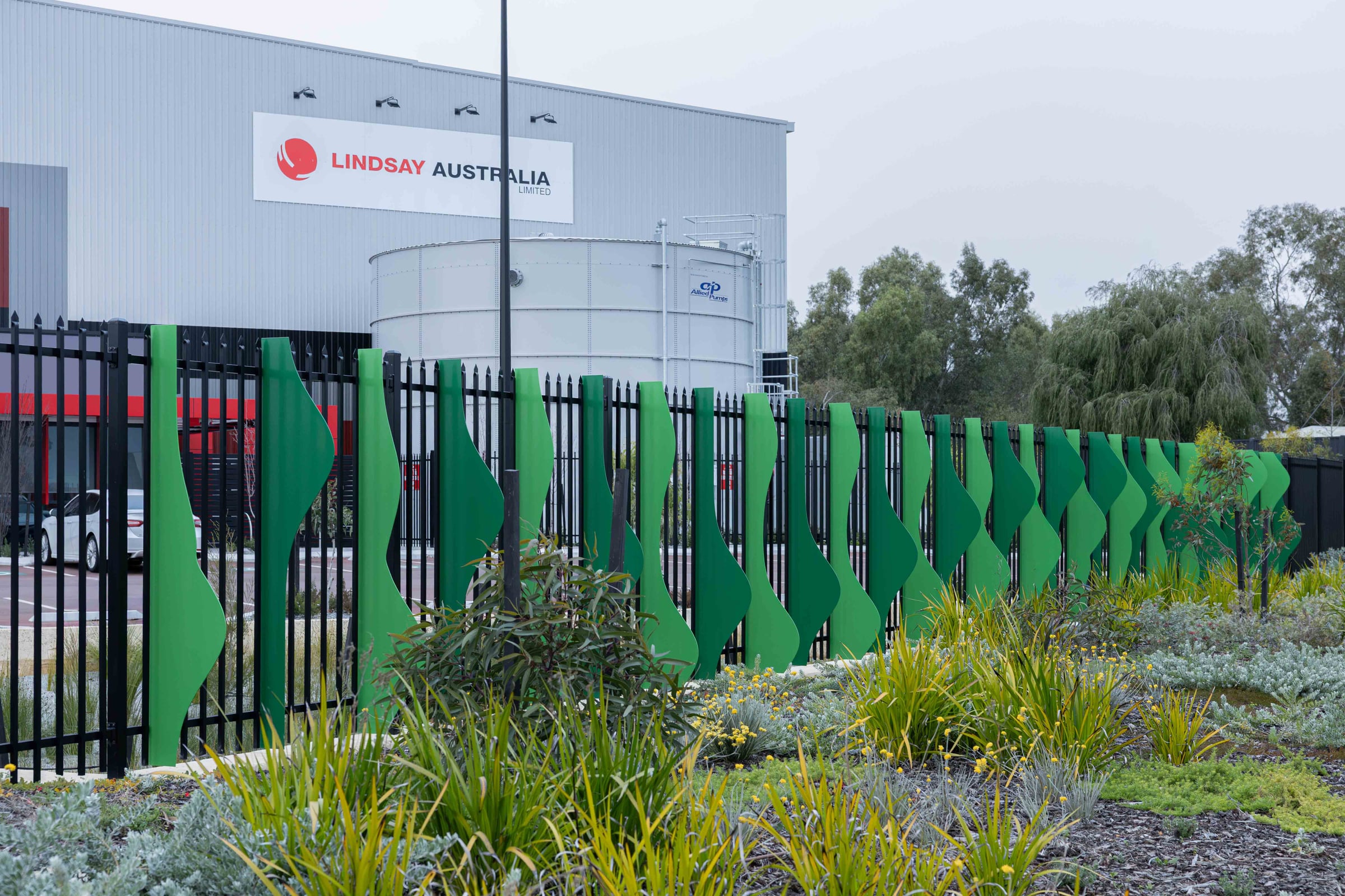 The green fins of Whispering Woodlands front the Lindsay warehouse site on Stirling Crescent, Hazelmere.